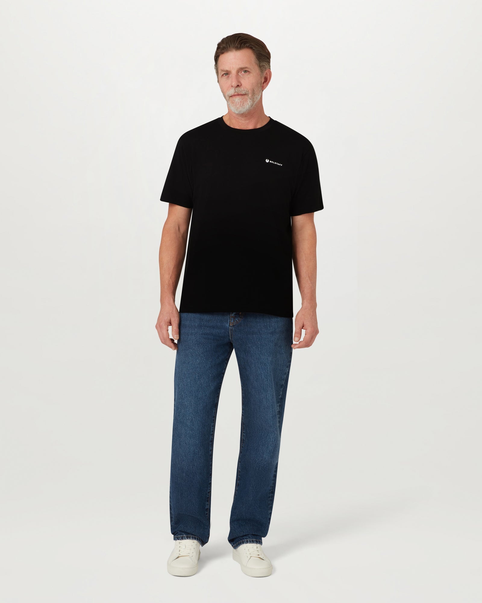 Folded Belstaff T shirts in white navy and black with small chest logos visible.