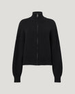 Close up of a black ATOL full zip cardigan in wool and cashmere with a high ribbed collar and silver zipper