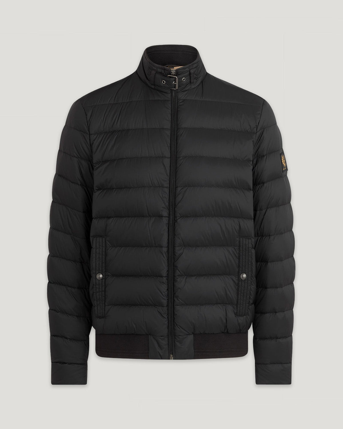 Close up of black Circuit Jacket with horizontal quilting and front zipper.