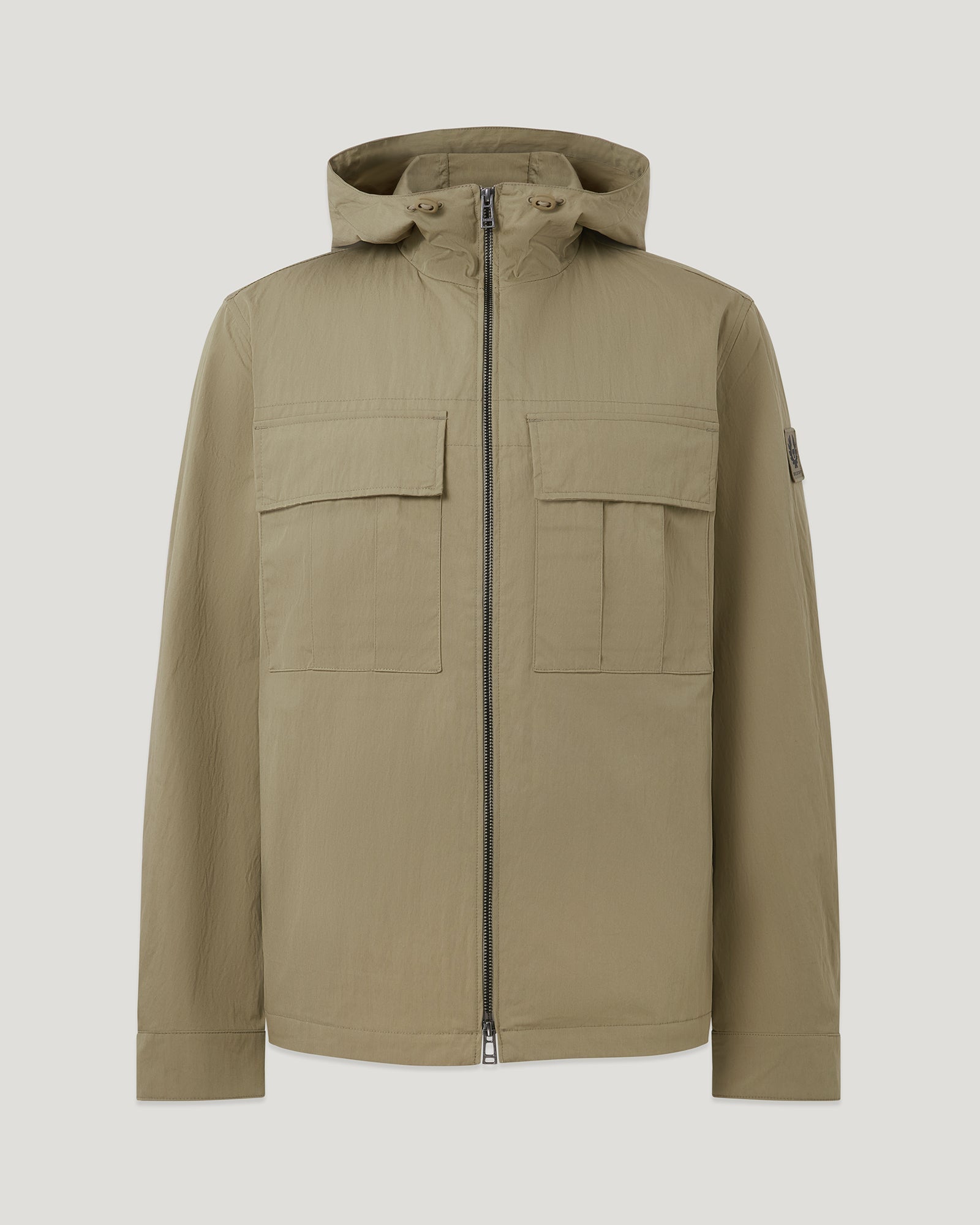 Container overshirt in Fatigue Green with two large chest pockets and front zipper.