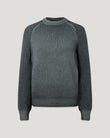 Male model wearing gray garment dye crew neck sweater with textured sleeves