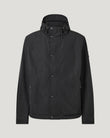 Front view of black Marsh Jacket on a model showing high collar and adjustable hood