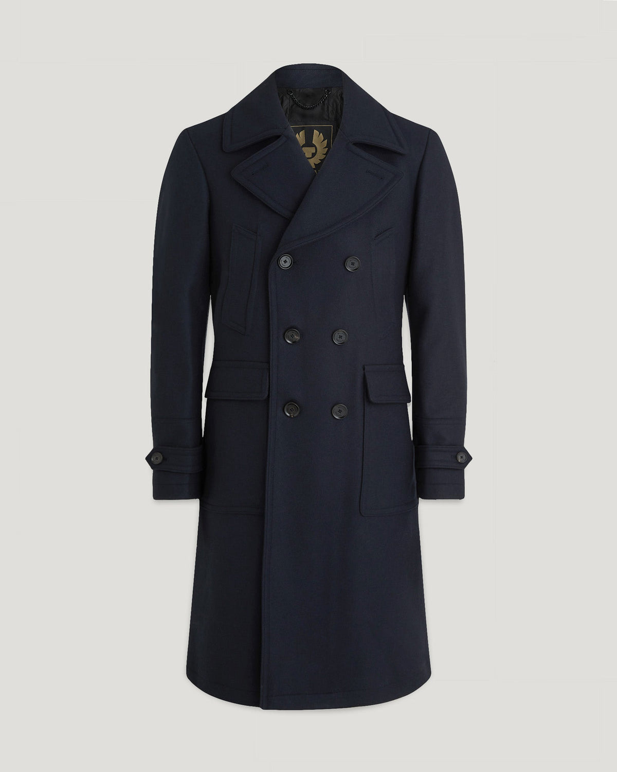 Ink blue Milford coat shown from the chest up with a double-breasted front and epaulettes.