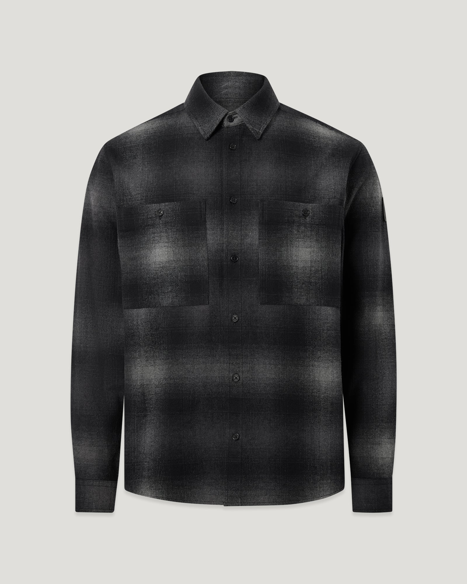 Outpost shirt brushed cotton flannel in dark charcoal with two chest pockets and front buttons.