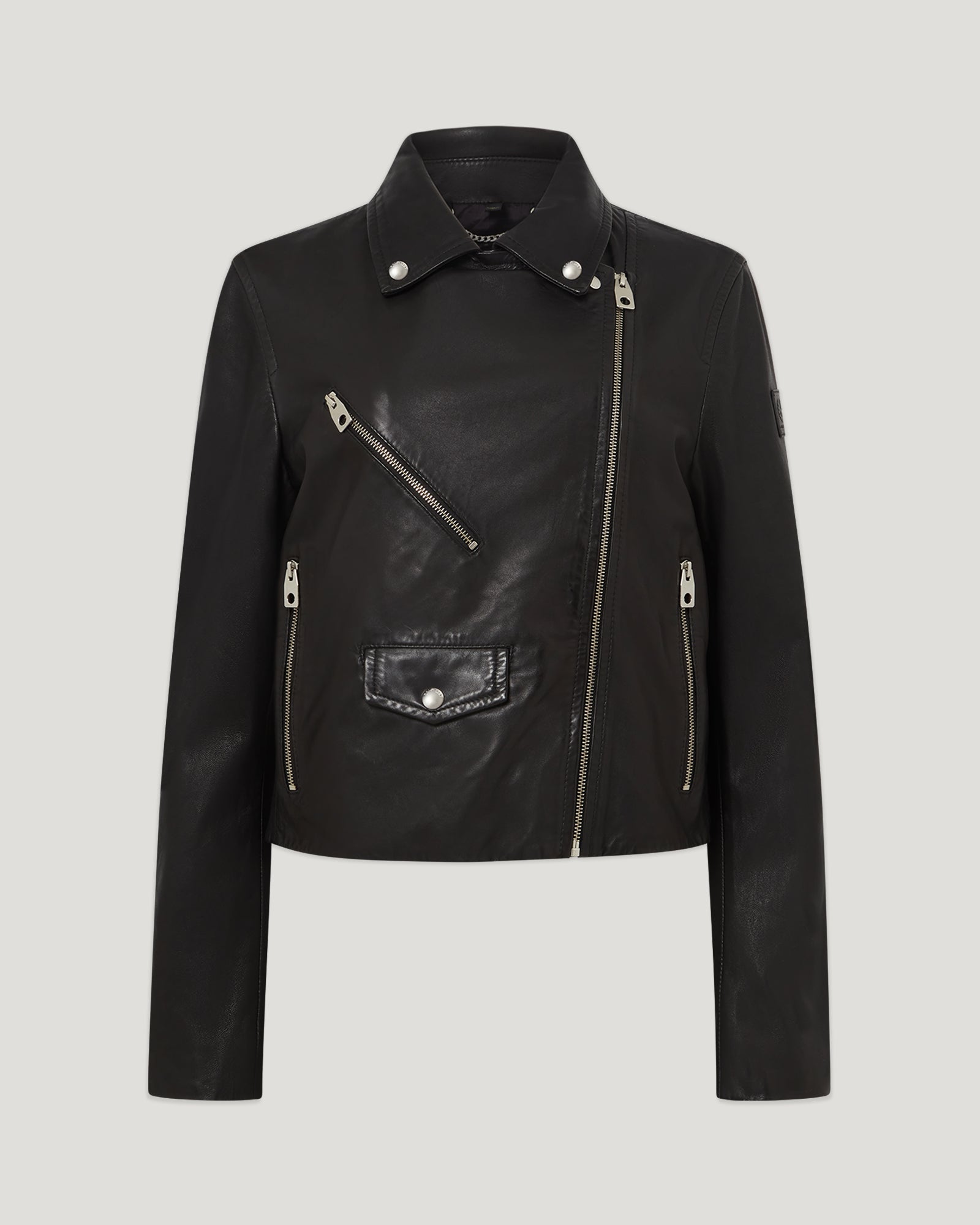 Sienna black leather biker jacket close up with diagonal zip and metal snaps.