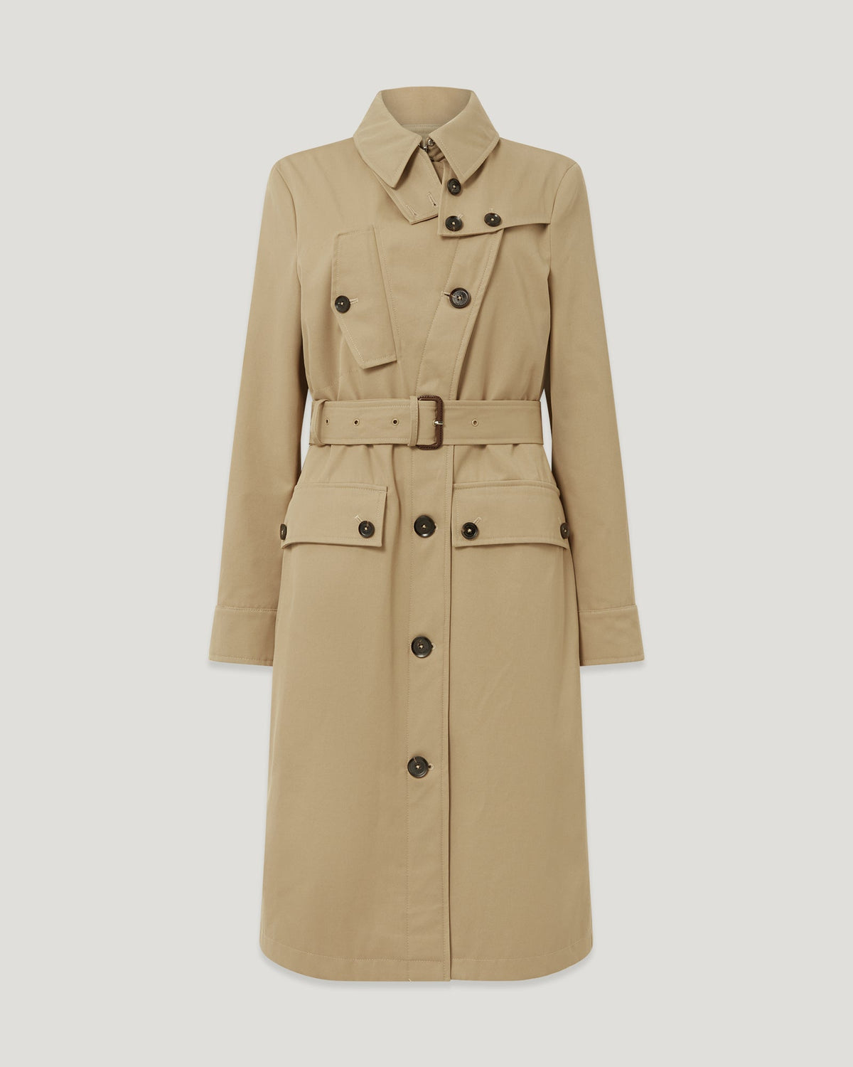 TT Trench Coat in Light Sand shown from chest to hips with a belt, patch pockets and dark buttons.