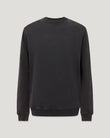 Model wearing the Valley garment-dye sweatshirt in Washed Black with a soft vintage finish