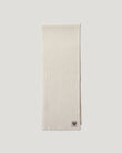 Watch Scarf in Pale Stone folded showing ribbed knit and brand patch.