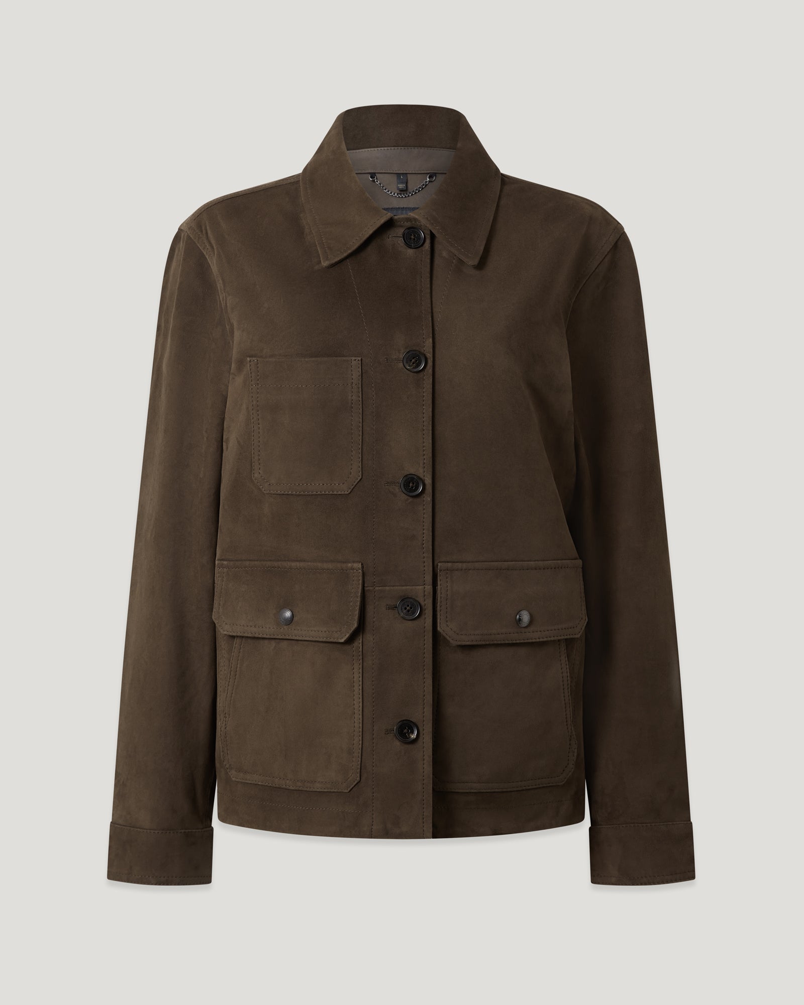 Trail jacket in black suede with multiple pockets and front button closure close-up of upper torso